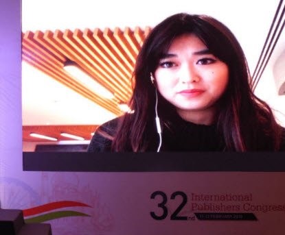 Angela Gui via video link at the 2018 IPA Congress
