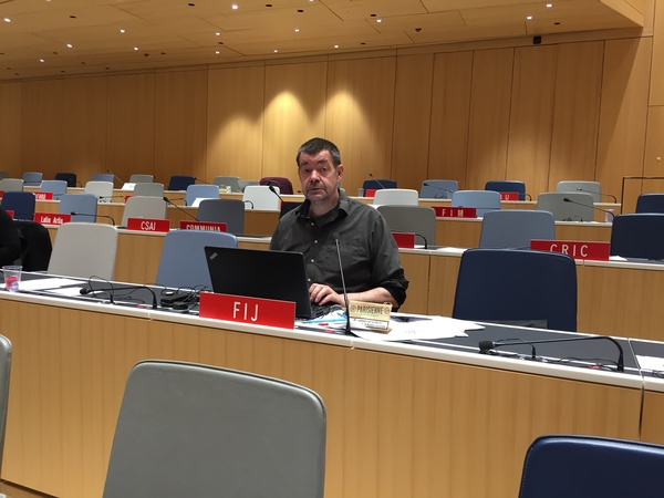 IFJ's Mike Holderness works on after the committee has adjourned