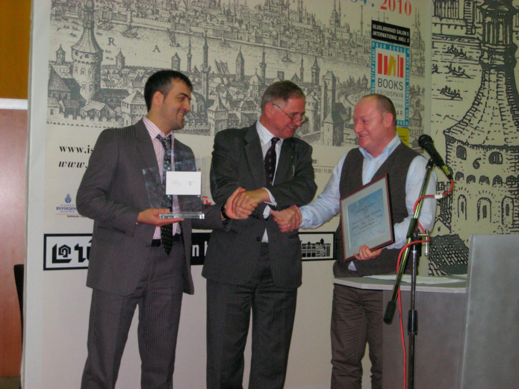 IPA President Herman P. Spruijt (centre) with Abdulla Duduev (left) and Israpil Shovkhalov (right) of the Dosh Magazine